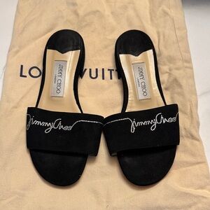 Jimmy Choo Black Slide Sandals with Silver Logo